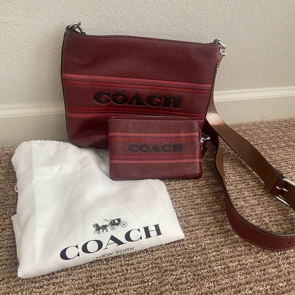 Authentic Coach crossbody with matching wristlet.  Gently used.